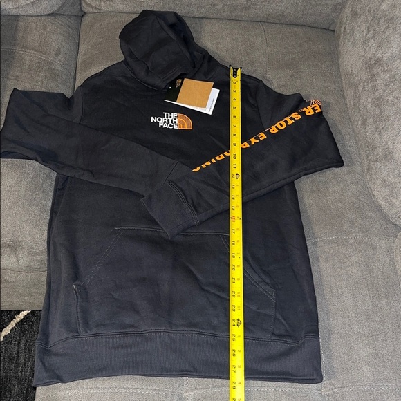 The North Face Charcoal Hoodie with Vibrant Orange Sleeve Design - Picture 3 of 14